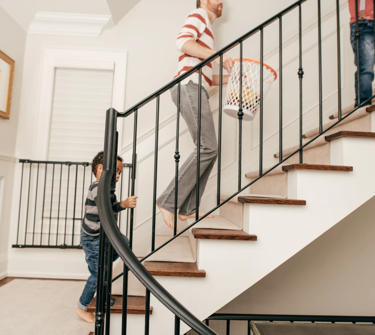 Walking up stairs with laundry basket